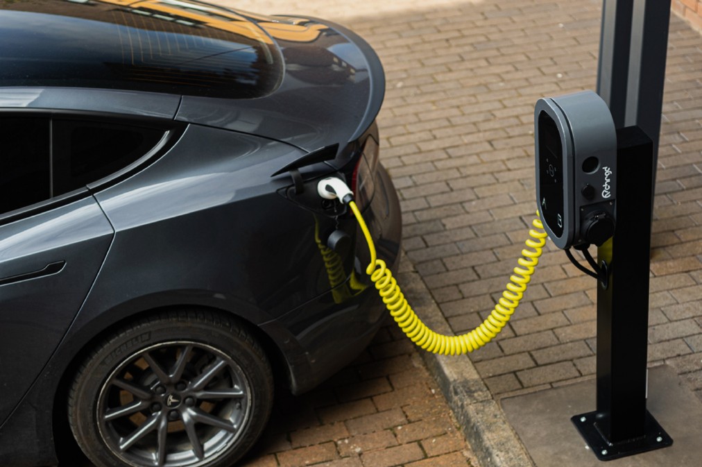 VCHRGD pedestal charger serving a commercial parking space